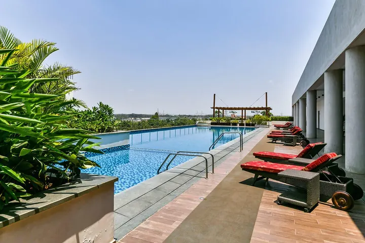 Tata New Haven, Bengaluru - another Tata Housing project Rooftop swimming pool with loungers at Tata New Haven, Bengaluru