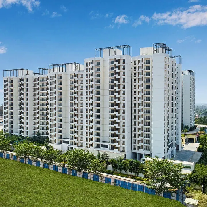Tata New Haven, Bengaluru - another Tata Housing project White apartment towers and lawns at Tata New Haven, Bengaluru